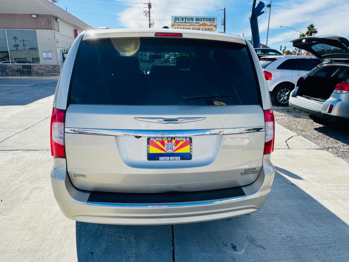 2015 gold Chrysler Town & Country (2C4RC1BG8FR) , located at 2190 Hwy 95, Bullhead City, AZ, 86442, (928) 704-0060, 0.000000, 0.000000 - 2015 Chrysler town and country . Loaded . Seats7 . Bluetooth , backup camera . Free warranty , we finance . drop down tv with dvd player. headphone sets. Michelin tires. v6 automatic . Top of the line van. Fully loaded. - Photo#4